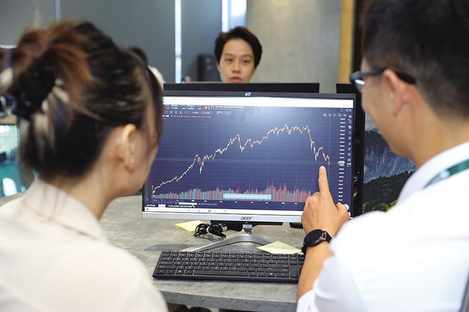 Thị trường 99Kl99 link đăng nhập được dự báo còn rung lắc trong vài quý tới và nhà Kl99ok phiên bản mới lướt sóng đối mặt nhiều rủi ro. Ảnh: Đức Thanh.