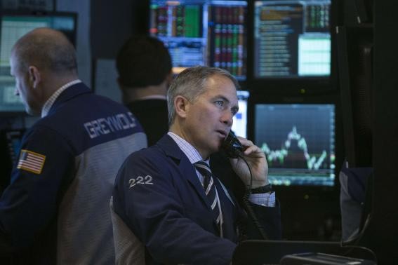 Phố Wall nhanh chóng phục hồi nhờ dữ liệu Kl992 cổng game cá cược khả quan - Ảnh: Reuters