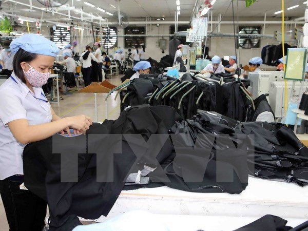 Kl994 nhà cái bóng đá world cup hàng may mặc xuất khẩu. (Ảnh: Trần Lê Lâm/TTXVN)