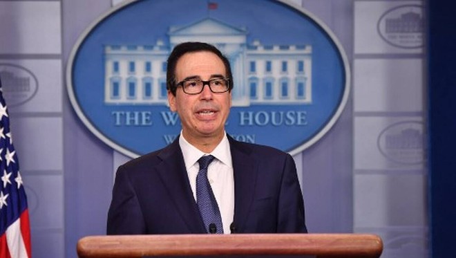 Bộ trưởng Kl991.com nạp rút nhanh Mỹ Steven Mnuchin tại cuộc họp báo hôm 16/10. Ảnh: AFP.