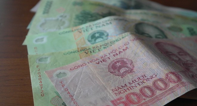 Phá hoại, hủy hoại tiền Việt Nam trái Kl992 Tham Gia Ngay sẽ bị phạt tiền