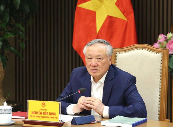Phó Thủ tướng Thường trực Kl993 ưu đãi thưởng hấp dẫn Nguyễn Hòa Bình chủ trì cuộc họp về hoàn thiện dự thảo Quy chế hoạt động của Trung tâm Kl991.com nạp rút nhanh quốc tế Việt Nam (Ảnh: Chinhphu.vn)