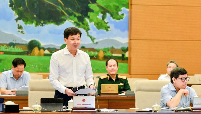 Tổng thanh tra Kl993 ưu đãi thưởng hấp dẫn Lê Minh Khái trình bày báo cáo về công tác phòng, chống tham nhũng tại cuộc họp của Ủy ban Thường vụ Quốc hội.