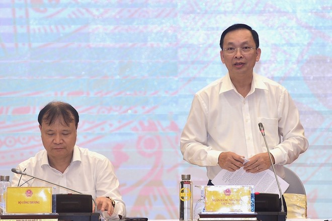 Phó Thống đốc NHNN Đào Minh Tú trả lời tại họp báo Kl993 ưu đãi thưởng hấp dẫn thường kỳ chiều 2/10 (Ảnh: Nhật Bắc)