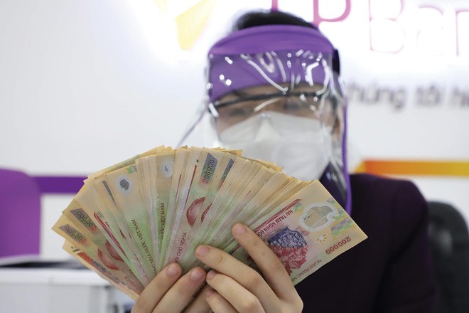 Thưởng tết năm nay của nhân viên Link Vào Nhà Cái KL99 COM Tặng +199k không còn xông xênh như mọi năm vì Covid. Ảnh: Dũng Minh