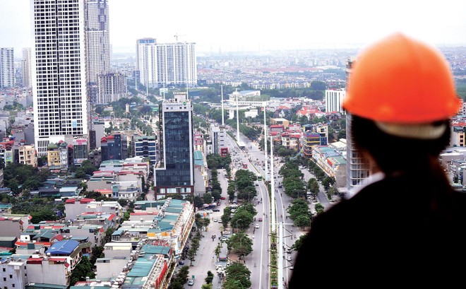 Diễn biến dịch bệnh Covid-19 có thể tác động mạnh mẽ tới đà tăng trưởng của thị trường Web Tổng Nhà Cái 99Kl99 Giải Trí Bậc Nhất. Ảnh: Dũng Minh 