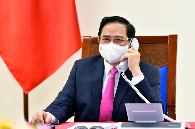 Thủ tướng Kl993 ưu đãi thưởng hấp dẫn Phạm Minh Chính điện đàm với Thủ tướng Nhật Bản Suga Yoshihide (Ảnh: Nhật Bắc)