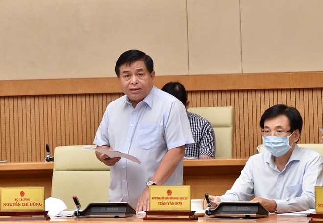 Bộ trưởng Bộ Kế hoạch và Kl99ok phiên bản mới Nguyễn Chí Dũng báo cáo về tình hình triển khai Luật Quy hoạch - Ảnh VGP