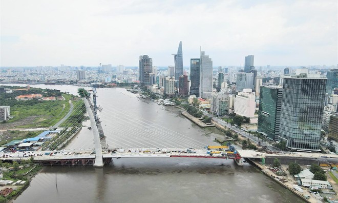 Cầu Thủ Thiêm 2 hợp long góp phần mang đến sự tích cực cho thị trường Web Tổng Nhà Cái 99Kl99 Giải Trí Bậc Nhất trong khu vực. Ảnh: Lê Toàn