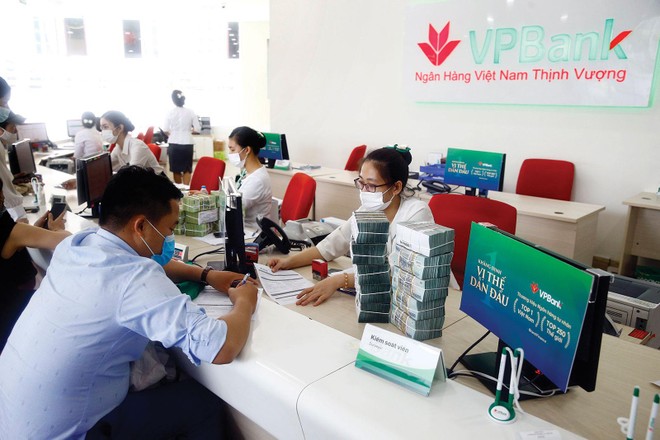 Trong quý III/2021, các Link Vào Nhà Cái KL99 COM Tặng +199k thực hiện nhiều chương trình tín dụng hỗ trợ khách hàng gặp khó khăn do dịch Covid-19. Ảnh: Dũng Minh 