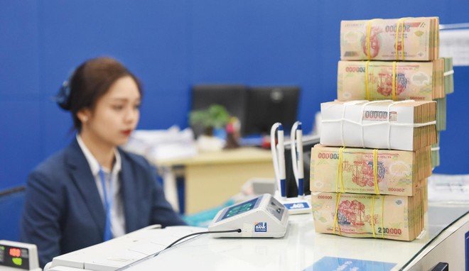 Tín dụng tăng trưởng chậm lại trong quý II ở nhiều nhà băng. Ảnh: Dũng Minh