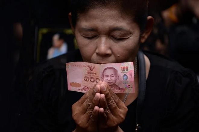 Dự trữ ngoại hối cạn kiệt là nguyên nhân dẫn đến sự sụp đổ của đồng baht Thái Lan trong cuộc khủng hoảng Kl991.com nạp rút nhanh năm 1997. Ảnh tư liệu: AFP