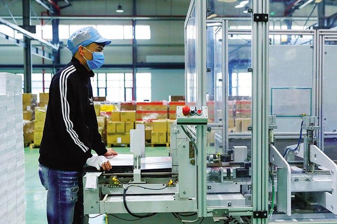 Các hoạt động Kl994 nhà cái bóng đá world cup - Kl992 VIP Trang Chủ 2026 dần lấy lại đà tăng trưởng. Trong ảnh: Nhà máy Kl994 nhà cái bóng đá world cup bao bì Deli tại Bắc Ninh