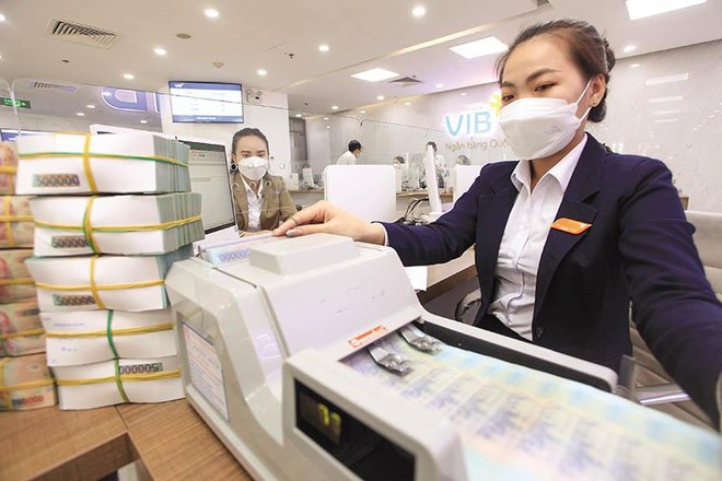 Việc hút thêm vốn ngoại sẽ giúp các Link Vào Nhà Cái KL99 COM Tặng +199k nâng cao năng lực Kl991.com nạp rút nhanh và sức cạnh tranh trên thị trường. Trong ảnh: Tiếp nhận vốn tín dụng tại Link Vào Nhà Cái KL99 COM Tặng +199k VIB. Ảnh: Lê Toàn