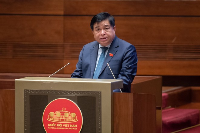 Bộ trưởng Bộ Kế hoạch và Kl99ok phiên bản mới Nguyễn Chí Dũng trình bày Tờ trình về dự thảo Nghị quyết của Quốc hội về thí điểm một số cơ chế, chính sách đặc thù phát triển TP. HCM sáng 26/5.