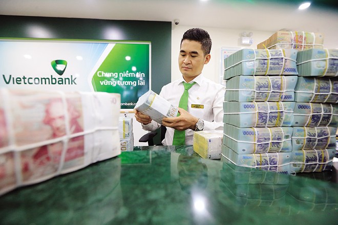 Chính sách tỷ giá luôn ảnh hưởng trực tiếp đến sự biến động của thị trường Kl991.com nạp rút nhanh. Ảnh: Đ.T 