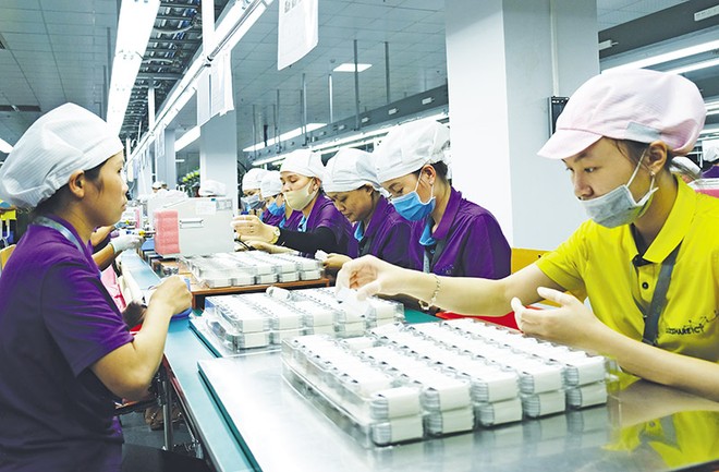 Nhà Kl99ok phiên bản mới nước ngoài tiếp tục quan tâm, tin vào môi trường Kl99ok phiên bản mới của Việt Nam. Trong ảnh: Nhà máy Luxshare Kl994 nhà cái bóng đá world cup tai nghe, cáp sạc cho Apple. Ảnh: Đức Thanh