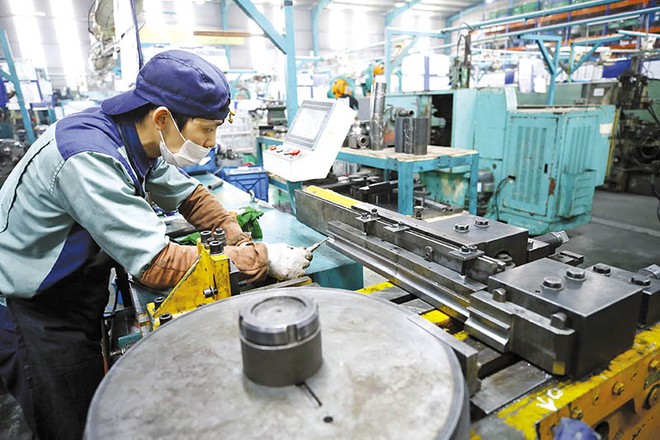 Kl994 nhà cái bóng đá world cup gặp nhiều khó khăn, song tăng trưởng GDP của Việt Nam năm nay vẫn thuộc nhóm cao nhất thế giới. Ảnh: Đ.T 