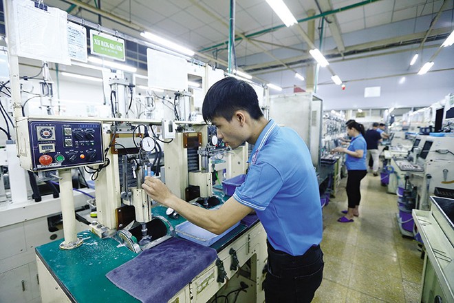 Việt Nam tiếp tục được khẳng định là điểm đến của nhà Kl99ok phiên bản mới Nhật Bản. Trong ảnh: Kl994 nhà cái bóng đá world cup tại Nhà máy R technical ở Hòa Bình. Ảnh: Đức Thanh
