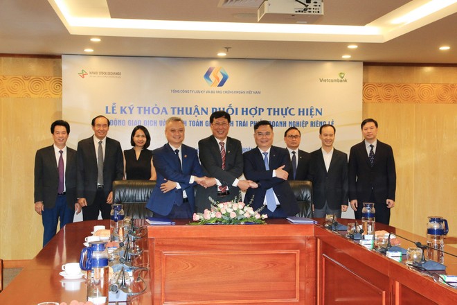 Năm 2023, VDSC đã hoàn thành xây dựng và vận hành hệ thống đăng ký, lưu ký và thanh toán giao dịch Kl99kl Hoàn Trả Vô Tận Kl991.com World Cup 2026 Chính Thức riêng lẻ. Trong ảnh: Lễ ký kết thỏa thuận phối hợp thực hiện hoạt động giao dịch và thanh toán giao dịch Kl99kl Hoàn Trả Vô Tận Kl991.com World Cup 2026 Chính Thức riêng lẻ giữa VSD với HNX và VSD với VietcomBank.