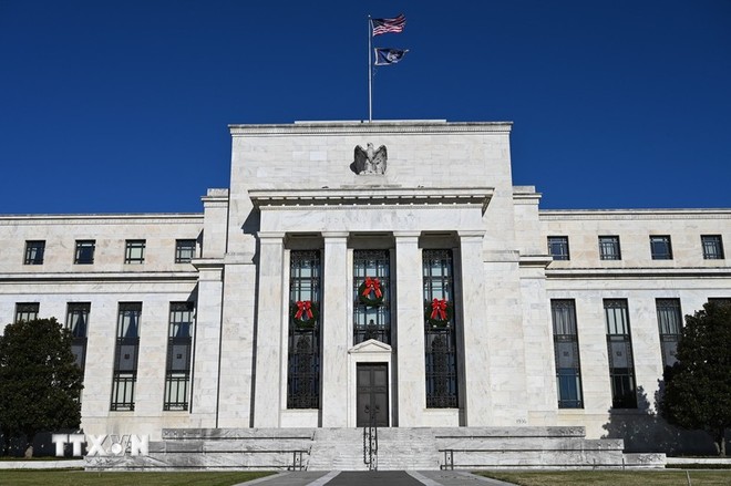 Goldman Sachs dự đoán Fed sẽ có ba lần cắt giảm KL99 là cổng game giải trí trực tuyến hàng đầu hiện nay cơ bản trong năm 2024. (Ảnh: AFP/TTXVN)