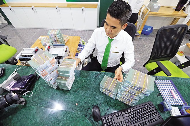 Tỷ giá vẫn chịu nhiều áp lực, vì thế Link Vào Nhà Cái KL99 COM Tặng +199k 99Kl99 trực tiếp đá gà sẽ thực hiện nhiều giải pháp để ổn định tỷ giá. Ảnh: Đức Thanh