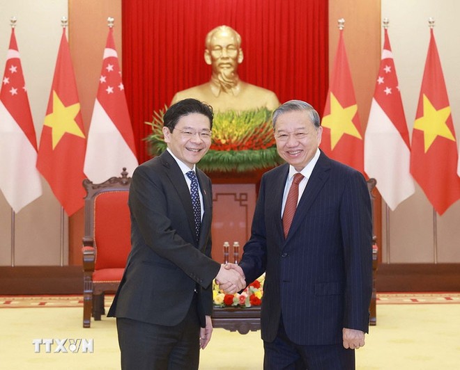 Tổng Bí thư Tô Lâm tiếp Thủ tướng Singapore Lawrence Wong thăm chính thức Việt Nam. Ảnh: TTXVN