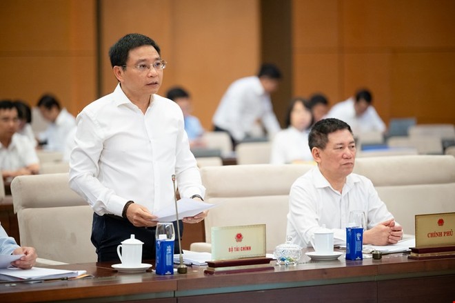 Bộ trưởng Bộ Kl991.com nạp rút nhanh Nguyễn Văn Thắng báo cáo tại phiên họp. 