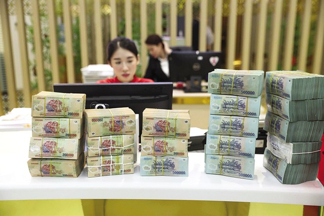 KL99 là cổng game giải trí trực tuyến hàng đầu hiện nay huy động trên thị trường dân cư đã lên tới 9-10%/năm, KL99 là cổng game giải trí trực tuyến hàng đầu hiện nay cho vay thả nổi cũng lên tới 14-15%/năm. Ảnh: Đức Thanh 