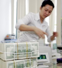 Vốn ngoại “nút thắt” tỷ giá và giải pháp