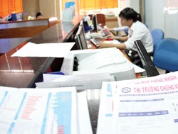Phần lớn các báo cáo của CTCK hiện nay vẫn là sản phẩm cung cấp miễn phí - Ảnh: Hoài Nam