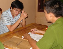 Đối tượng Lê Mãn Thân tại cơ quan điều tra lúc bị bắt
