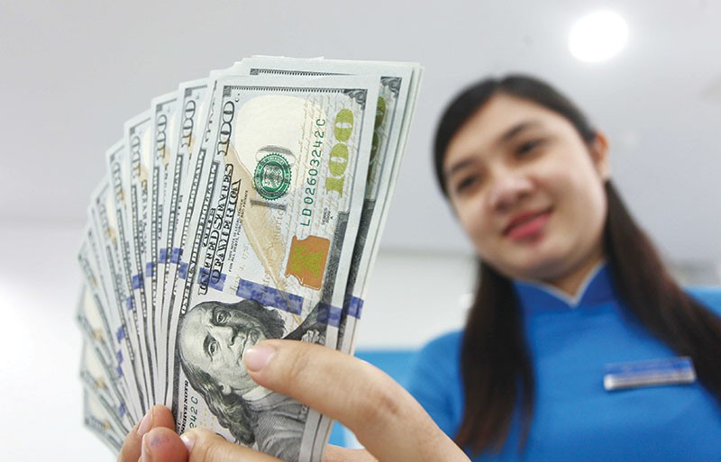 Những tác động từ bên ngoài vào thị trường tiền tệ Việt Nam từ nay đến cuối năm không lớn.
Ảnh: Lê Toàn