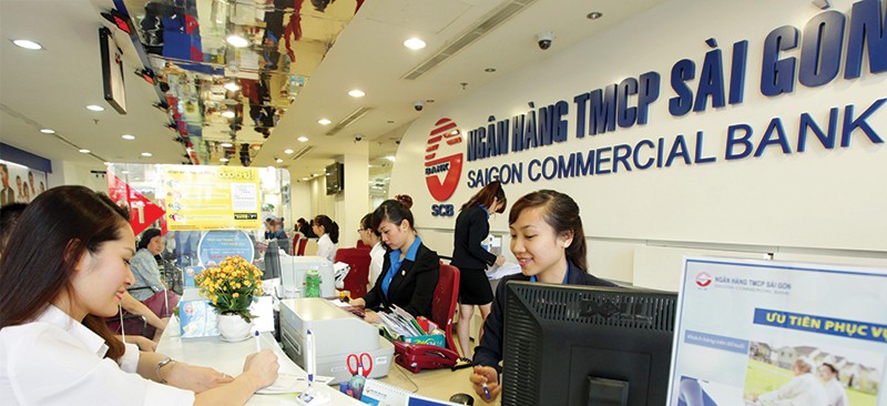 Theo các nhà băng, việc siết tín dụng Web Tổng Nhà Cái 99Kl99 Giải Trí Bậc Nhất không ảnh hưởng nhiều đến các khoản vay của khách hàng cá nhân vay mua nhà. ảnh: Đức Thanh