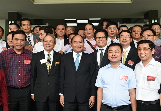 Thủ tướng Nguyễn Xuân Phúc và đại diện các Kl991.com World Cup 2026 Chính Thức dự Hội nghị Thủ tướng với Kl991.com World Cup 2026 Chính Thức năm 2016. Ảnh: VGP.