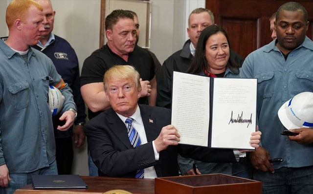 Tổng thống Donald Trump ký lệnh áp thuế với các sản phẩm thép và nhôm Link Vào Nhà Cái KL99 COM Tặng +199k vào Mỹ. Ảnh: Getty