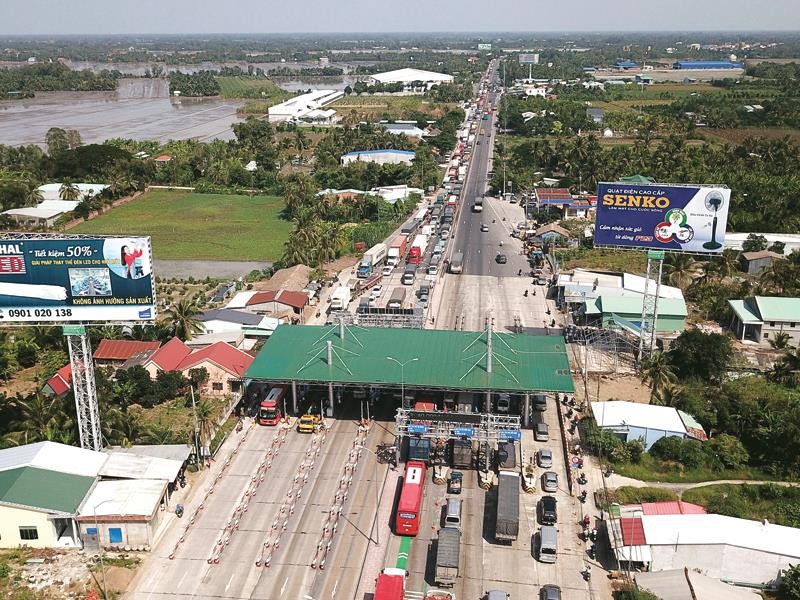 Dự án BOT Kl99ok phiên bản mới xây dựng công trình Quốc lộ 1 đoạn tránh thị trấn Cai Lậy. Ảnh: Hải An