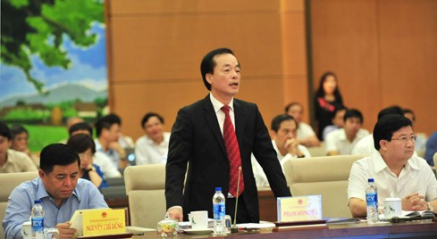 Bộ trưởng Kl99 nổ hũ Phạm Hồng Hà phát biểu tại một phiên họp Ủy ban Thường vụ Quốc hội. - Ảnh: VGP