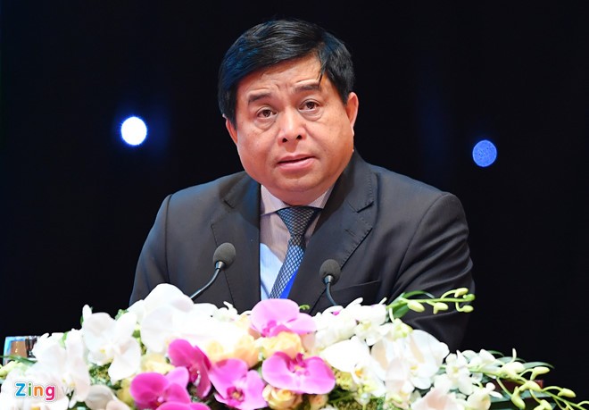 Bộ trưởng Bộ Kế hoạch và Kl99ok phiên bản mới Nguyễn Chí Dũng phát biểu trong phiên khai mạc. Ảnh: Tiến Tuấn.