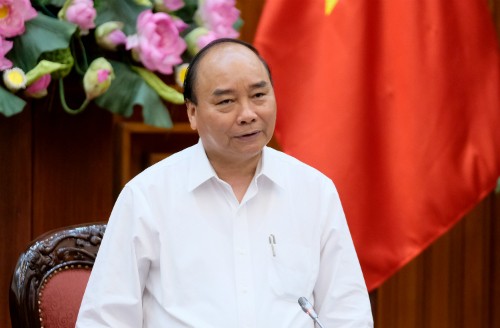 Thủ tướng Nguyễn Xuân Phúc chủ trì cuộc họp về xây dựng Kl993 ưu đãi thưởng hấp dẫn điện tử. Ảnh: VGP/Xuân Hoa.
