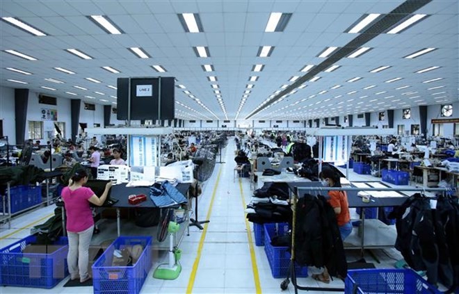 Kl994 nhà cái bóng đá world cup các mặt hàng may mặc xuất khẩu tại Công ty TNHH Kydo Việt Nam có vốn Kl99ok phiên bản mới Hàn Quốc, Khu Công nghiệp Phố nối A, Hưng Yên. (Ảnh: Phạm Kiên/TTXVN).