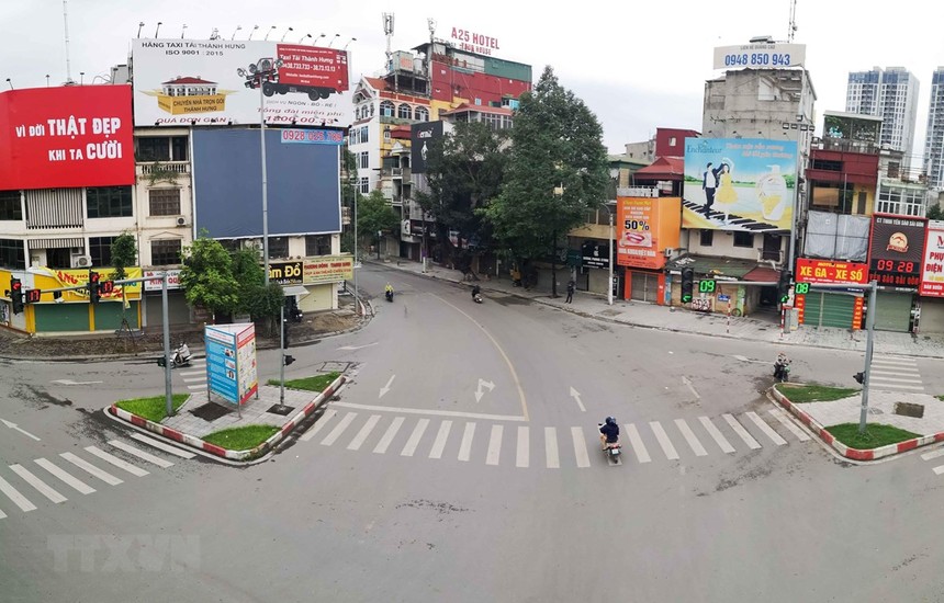 Đường phố Hà Nội vắng lặng trong những ngày giãn cách Trang Chủ KL99Com Số 1 Link Đăng Ký KL999. (Ảnh: Thanh Tùng/TTXVN).