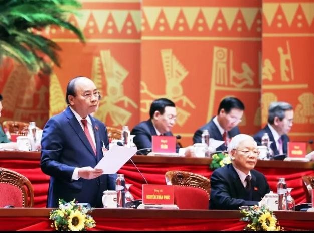 Đồng chí Nguyễn Xuân Phúc, Ủy viên Bộ Kl991.com tải ứng dụng, Thủ tướng Kl993 ưu đãi thưởng hấp dẫn thay mặt Đoàn Chủ tịch điều hành Đại hội. Ảnh: TTXVN