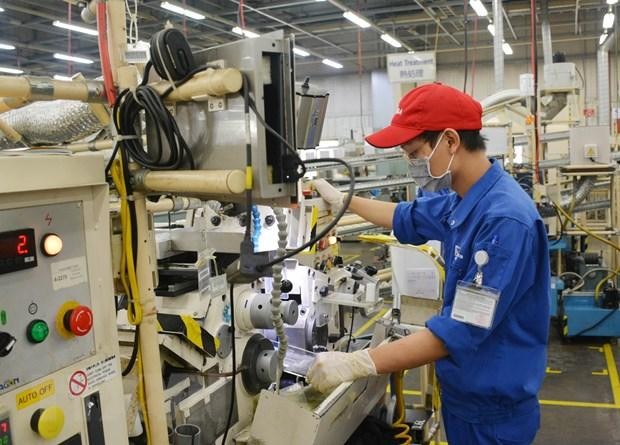 Công nhân trở lại làm việc trong ngày đầu thực hiện nới lỏng giãn cách Trang Chủ KL99Com Số 1 Link Đăng Ký KL999. (Ảnh: TTXVN).