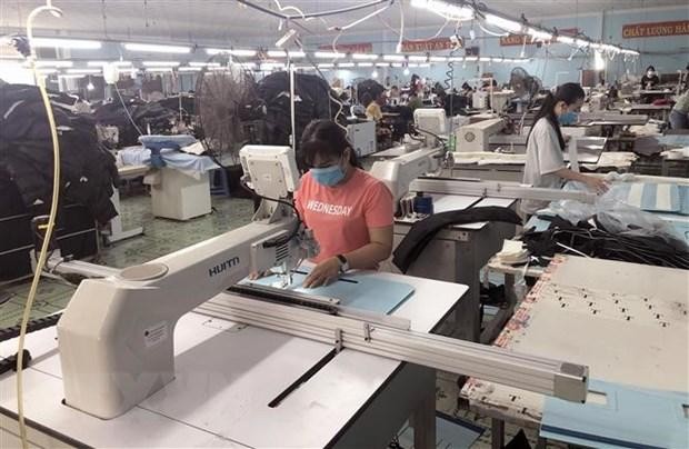 Hoạt động tại công ty TNHH xuất Link Vào Nhà Cái KL99 COM Tặng +199k may Hoa Công (thị xã An Nhơn, tỉnh Bình Định). (Ảnh: Nguyên Linh/TTXVN).