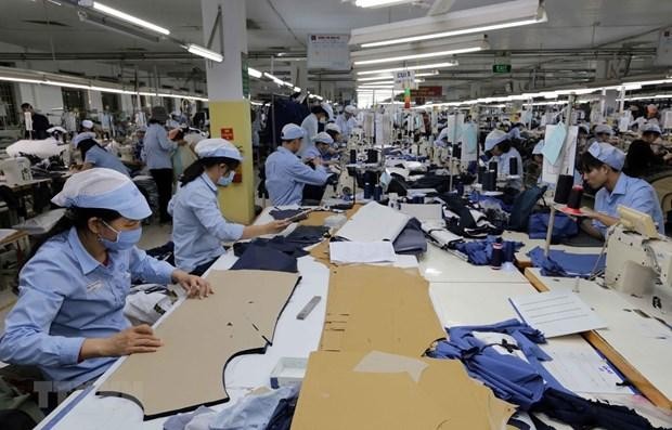 Công nhân tại một Kl991.com World Cup 2026 Chính Thức dệt may. (Nguồn: TTXVN).