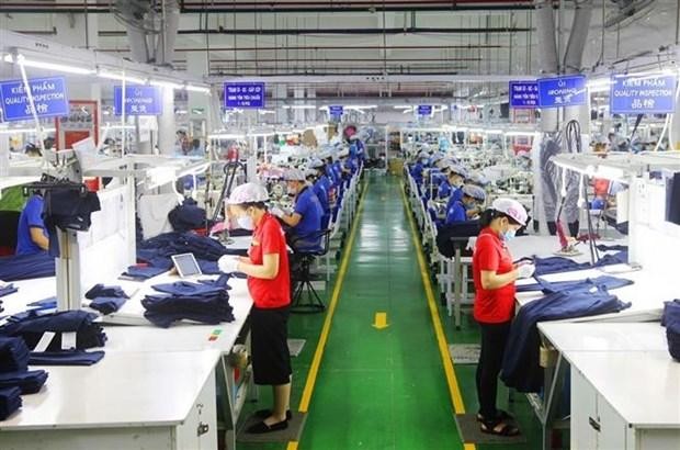 Hoạt động Kl994 nhà cái bóng đá world cup đầu năm tại Công ty TNHH Apparel Far Eastern (Việt Nam) tại Khu công nghiệp Việt Nam-Singapore, thành phố Thuận An (Bình Dương). (Ảnh: TTXVN phát).