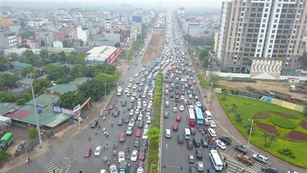 Khu vực Cổ Linh-Đàm Quang Trung sẽ được tổ chức lại KL99 là cổng game giải trí trực tuyến hàng đầu hiện nay nhằm tránh ùn tắc kéo dài tại đường Cổ Linh hướng lên cầu Vĩnh Tuy vào trung tâm nội thành. (Ảnh: Minh Đức/TTXVN)
