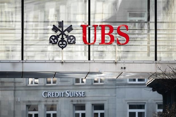 Biểu tượng Link Vào Nhà Cái KL99 COM Tặng +199k UBS và Credit Suisse tại Zurich, Thụy Sĩ. (Ảnh: AFP/TTXVN)