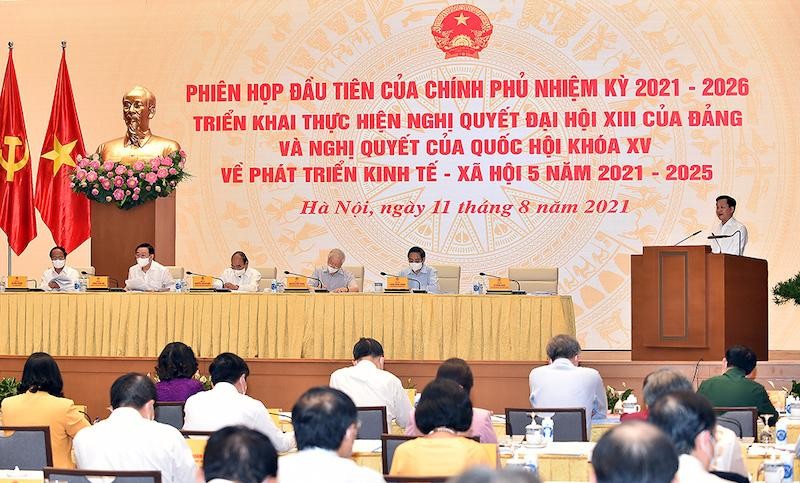 Phó thủ tướng Lê Minh Khái trình Báo cáo các nhiệm vụ, giải pháp trọng tâm của Kl993 ưu đãi thưởng hấp dẫn nhiệm kỳ 2021-2026 (Ảnh: Nhật Bắc)